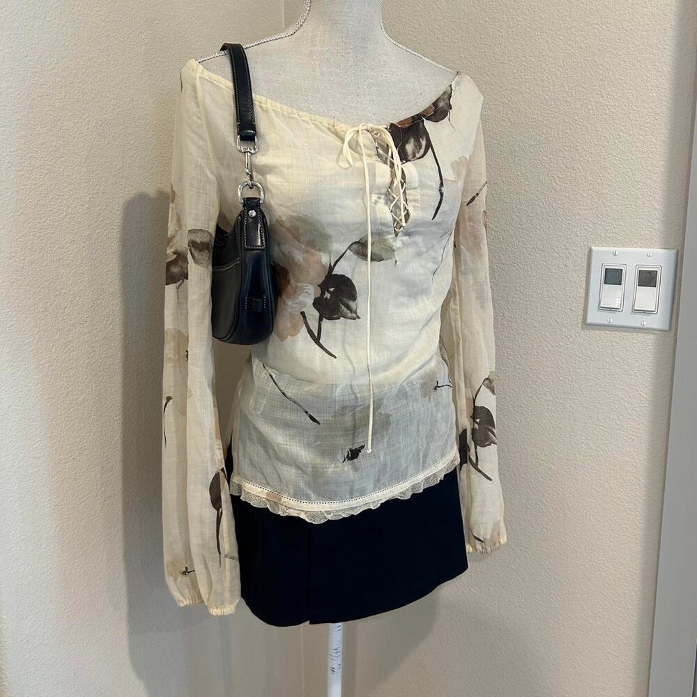 Elie Tahari Zoe cream floral wool blend lace up top.